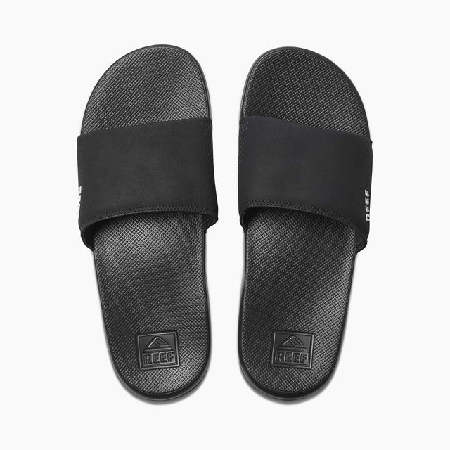 reef one slide black slipper