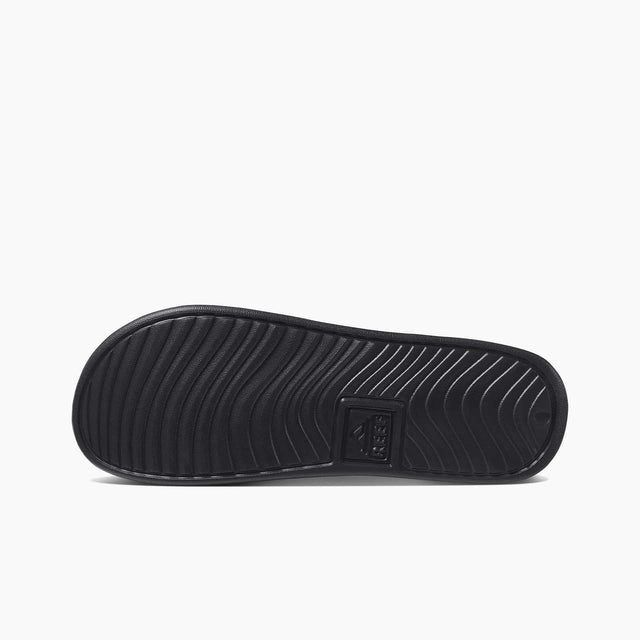 reef one slide black slipper